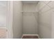 Walk-in closet with installed shelving, providing ample storage space and organization potential at 8253 Martello Ln, Raleigh, NC 27613
