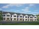 A row of townhomes shows a modern exterior with stone accents and complementary trim at 827 Old Tarboro Rd, Wendell, NC 27591