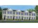 Stylish new townhome with neutral siding, stone accents, and an inviting facade at 828 Old Tarboro Rd, Wendell, NC 27591