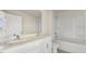 Bathroom featuring a double sink vanity, a large mirror, and a shower/tub at 829 Old Tarboro Rd, Wendell, NC 27591