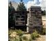 Stone sign for The Townes at Anderson Farm, surrounded by greenery and landscaping at 829 Old Tarboro Rd, Wendell, NC 27591