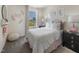 Charming bedroom with a double bed, stylish decor, and a view of the neighborhood at 833 Ottawa Dr, Garner, NC 27529