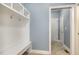 Functional mudroom area featuring a built-in bench, storage, and convenient access to other rooms at 91 Carsons Creek Trl, Wendell, NC 27591