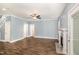 Spacious living room with hardwood floors and a fireplace at 91 Carsons Creek Trl, Wendell, NC 27591