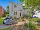 Charming backyard featuring outdoor seating, providing a serene space to relax and entertain at 945 St Marys St, Raleigh, NC 27605