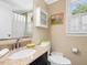Cozy bathroom featuring granite vanity top and medicine cabinet for ample storage at 945 St Marys St, Raleigh, NC 27605