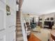Inviting foyer showcasing hardwood floors and staircase leading to the upper level at 945 St Marys St, Raleigh, NC 27605