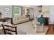 Cozy living room featuring a neutral color scheme, classic furnishings, and natural light at 945 St Marys St, Raleigh, NC 27605