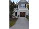 Two-story home featuring an attached garage and manicured landscaping at 958 Shining Wire Way, Morrisville, NC 27560