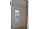 Walk-in closet with shelving and a window for natural light at 958 Shining Wire Way, Morrisville, NC 27560