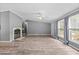 Living room with a cozy fireplace and new hardwood flooring, creating an inviting atmosphere at 1004 Candlewood Cir, Siler City, NC 27344