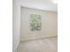 This bedroom has natural light, neutral paint, and carpet at 1009 Magnolia Leaf Ct, Apex, NC 27502