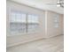 Bright bedroom with neutral carpet and multiple windows at 1009 Magnolia Leaf Ct, Apex, NC 27502