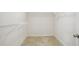 Walk-in closet with carpeted floor and white wire shelving for organization at 1009 Magnolia Leaf Ct, Apex, NC 27502