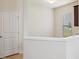 Bright dining area with tile floors, white walls and trim, and large windows at 1009 Magnolia Leaf Ct, Apex, NC 27502