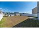 Grassy backyard offering ample space and backyard views at 103 Norris Creek Dr, Clayton, NC 27527