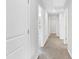 Hallway with carpet and access to other rooms in the house at 103 Norris Creek Dr, Clayton, NC 27527
