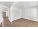 Spacious living room with hardwood floors and neutral walls, offering a versatile living space at 103 Norris Creek Dr, Clayton, NC 27527