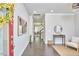 Bright foyer features hardwood floors, neutral walls, and an open view into the living spaces beyond at 120 Chapel Run Way, Chapel Hill, NC 27517