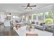 Spacious open-concept living area with hardwood floors, connecting the living room, dining area, and kitchen at 120 Chapel Run Way, Chapel Hill, NC 27517