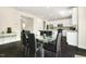 Open concept living and dining area with a view into the kitchen and lots of space at 121 Martingale Dr, Holly Springs, NC 27540