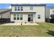 Charming home featuring a spacious backyard and patio area at 121 Martingale Dr, Holly Springs, NC 27540