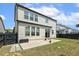 Charming home featuring a spacious backyard and patio area at 121 Martingale Dr, Holly Springs, NC 27540