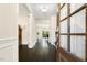 Elegant foyer featuring hardwood floors, natural light, and an inviting entrance at 121 Martingale Dr, Holly Springs, NC 27540
