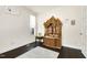 Comfortable living room with ample lighting, hardwood floors, and glass paneled doors at 121 Martingale Dr, Holly Springs, NC 27540