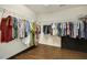 Spacious walk-in closet with ample storage and organization features at 121 Martingale Dr, Holly Springs, NC 27540