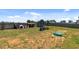 Large backyard with playground and ample space for outdoor activities at 124 Boomer St, Benson, NC 27504