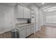 Granite countertops complement this kitchen with ample storage at 124 Boomer St, Benson, NC 27504