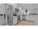 Stylish kitchen featuring stainless steel appliances and sleek countertops at 124 Boomer St, Benson, NC 27504