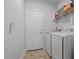 Clean laundry room featuring modern appliances and a spacious layout at 124 Boomer St, Benson, NC 27504