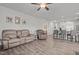 Open concept living room with hardwood floors and neutral colors at 124 Boomer St, Benson, NC 27504