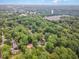 Aerial view of a neighborhood with mature trees at 125 Amesbury Ln, Cary, NC 27511