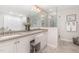 Dual sink bathroom vanity, glass shower, and large mirror at 125 Amesbury Ln, Cary, NC 27511
