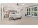 Neutral bedroom features a large window seat with a white and gray color palette at 125 Amesbury Ln, Cary, NC 27511