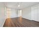 Neutral bedroom with view to closet and doorway to updated bathroom at 1304 Greenside Dr, Raleigh, NC 27609