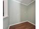 Flex room features neutral walls and wood floors, suitable for a variety of uses at 1304 Greenside Dr, Raleigh, NC 27609