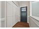 Home foyer featuring wood floors, a closet, and a view into a home at 1304 Greenside Dr, Raleigh, NC 27609