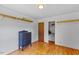 This bedroom features hardwood floors and closet space at 137 Vaiden Rd, Louisburg, NC 27549