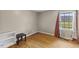Bedroom featuring hardwood floors, natural lighting, and neutral walls at 137 Vaiden Rd, Louisburg, NC 27549