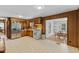 Bright kitchen featuring stainless steel appliances and an adjacent dining area at 137 Vaiden Rd, Louisburg, NC 27549