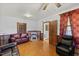 Inviting living room with hardwood floors and classic fireplace feature at 137 Vaiden Rd, Louisburg, NC 27549