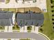 Birds eye view of townhome roofs and driveways in a well-maintained residential area at 1394 Southpoint Trl, Durham, NC 27713