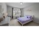 Cozy bedroom with a window view, featuring a 'Palmer' name decoration and a comfortable bed at 1394 Southpoint Trl, Durham, NC 27713