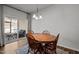 Inviting dining area featuring a wooden table and chairs, natural light, and a cozy atmosphere for meals at 1394 Southpoint Trl, Durham, NC 27713