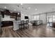 Open-concept living space featuring a modern kitchen, dining area, and comfortable seating, ideal for entertaining at 1394 Southpoint Trl, Durham, NC 27713