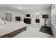 Large main bedroom with soft carpeting, and an ensuite bathroom makes for a private and relaxing retreat at 1394 Southpoint Trl, Durham, NC 27713